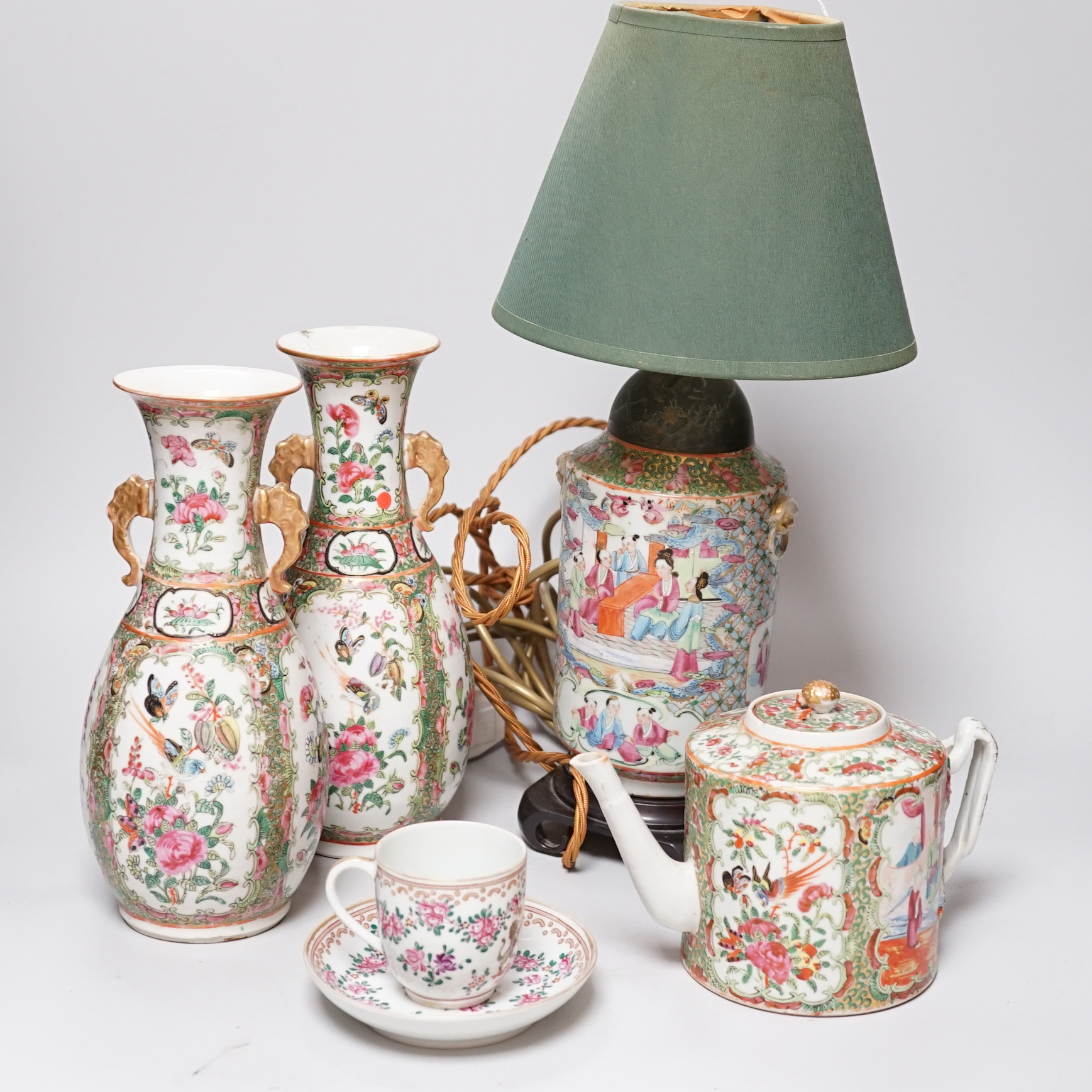 A pair of Chinese famille rose vases and a lamp base and a teapot and a Samson of Paris cup and saucer, (5)